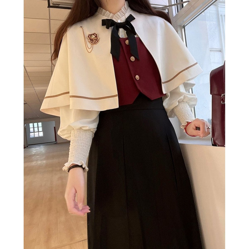Elegant Long Skirt and Cape Ensemble