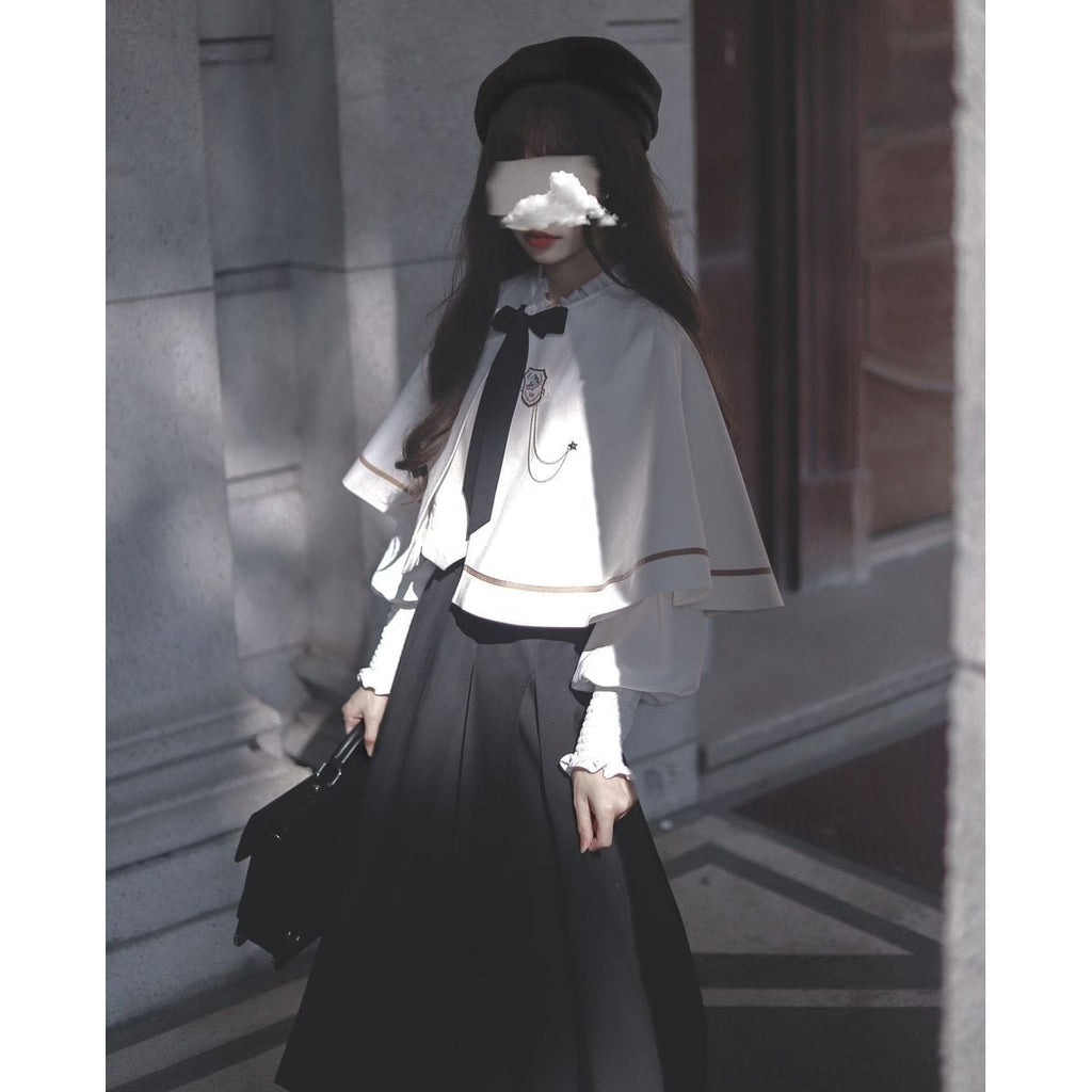 Elegant Long Skirt and Cape Ensemble