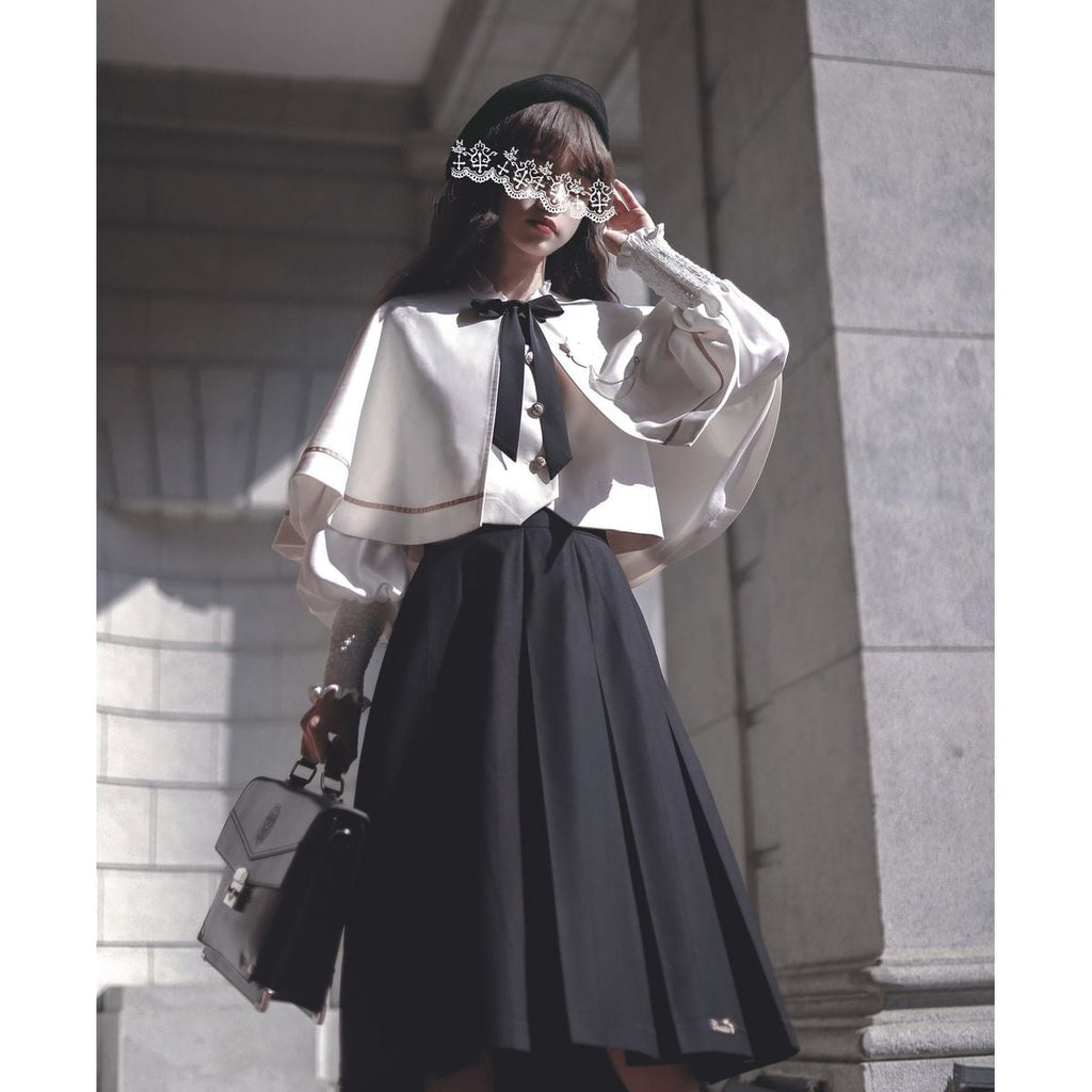Elegant Long Skirt and Cape Ensemble
